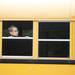 A young student looks out a bus window at Abbot Elementary School on the first day of school Tuesday morning. Daniel Brenner I AnnArbor.com
